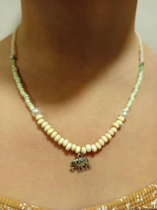 Turquoise Sand Necklace with Sun & Elephant Pendant