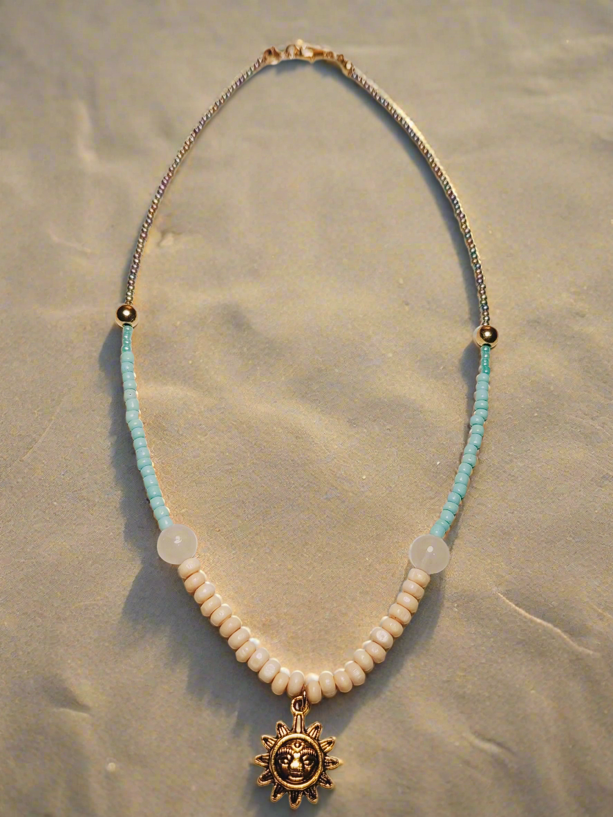 Turquoise Sand Necklace with Sun & Elephant Pendant
