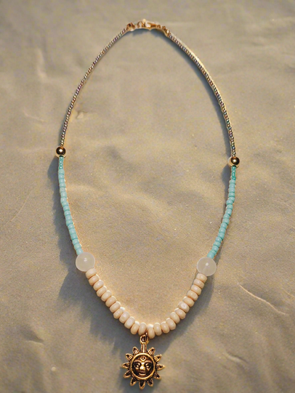 Turquoise Sand Necklace with Sun & Elephant Pendant
